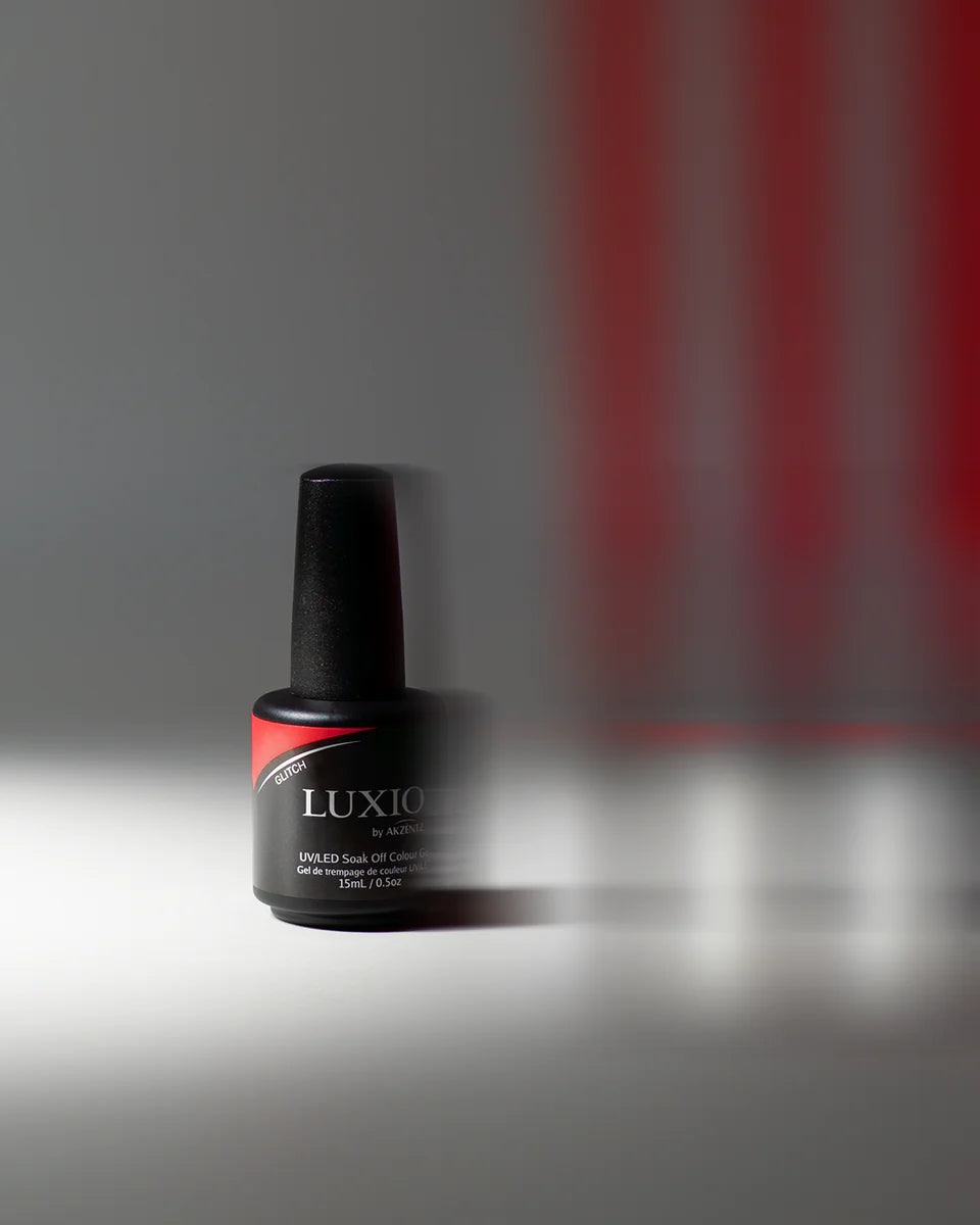 Luxio Luxio Soak-Off Gel Polish Glitch in Opaque 15ml bottle, showcasing vibrant, glossy nail polish color and branding.