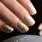 Luxio Soak-Off Gel Polish in Gold Glitter, 15ml bottle, with shimmering gold and glitter finish for manicures and nail art.