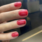 Luxio Soak-Off Gel Polish in Jelli Red tint, 15ml bottle, featuring glossy red gel polish for nails.