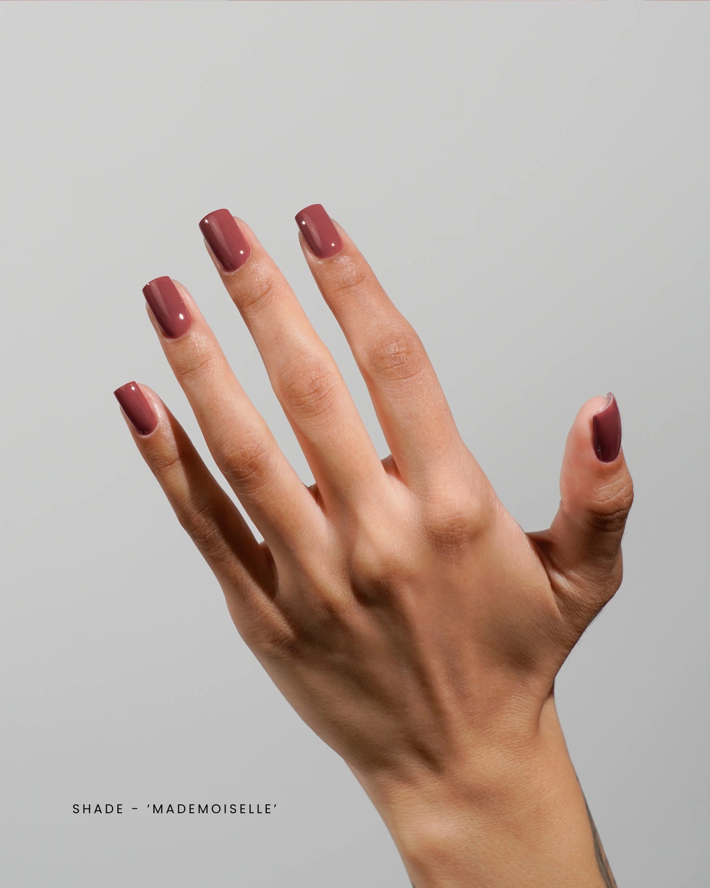 Luxio Soak-Off Gel Polish Mademoiselle 15ml bottle with a sleek black cap and clear label, showcasing the luxurious gel polish design