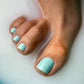 Luxio Soak-Off Gel Polish Marina 15ml bottle, featuring sleek branding and vibrant blue gel polish for nails.