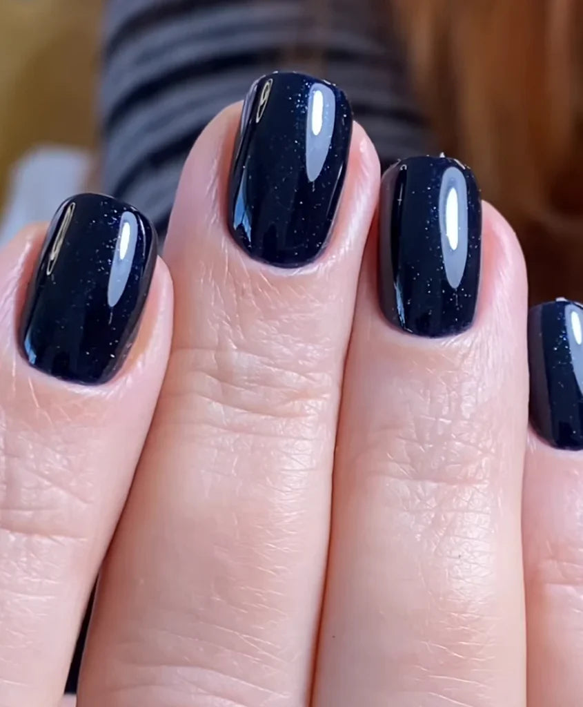 Luxio Luxio Soak-Off Gel Polish Moonlight Sparkle 15ml with shimmering, light blue gel polish in a clear bottle.