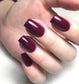 Luxio Soak-Off Gel Polish in Mystery color, 15ml bottle with glossy nail finish and smooth application, displayed on a neutral background.