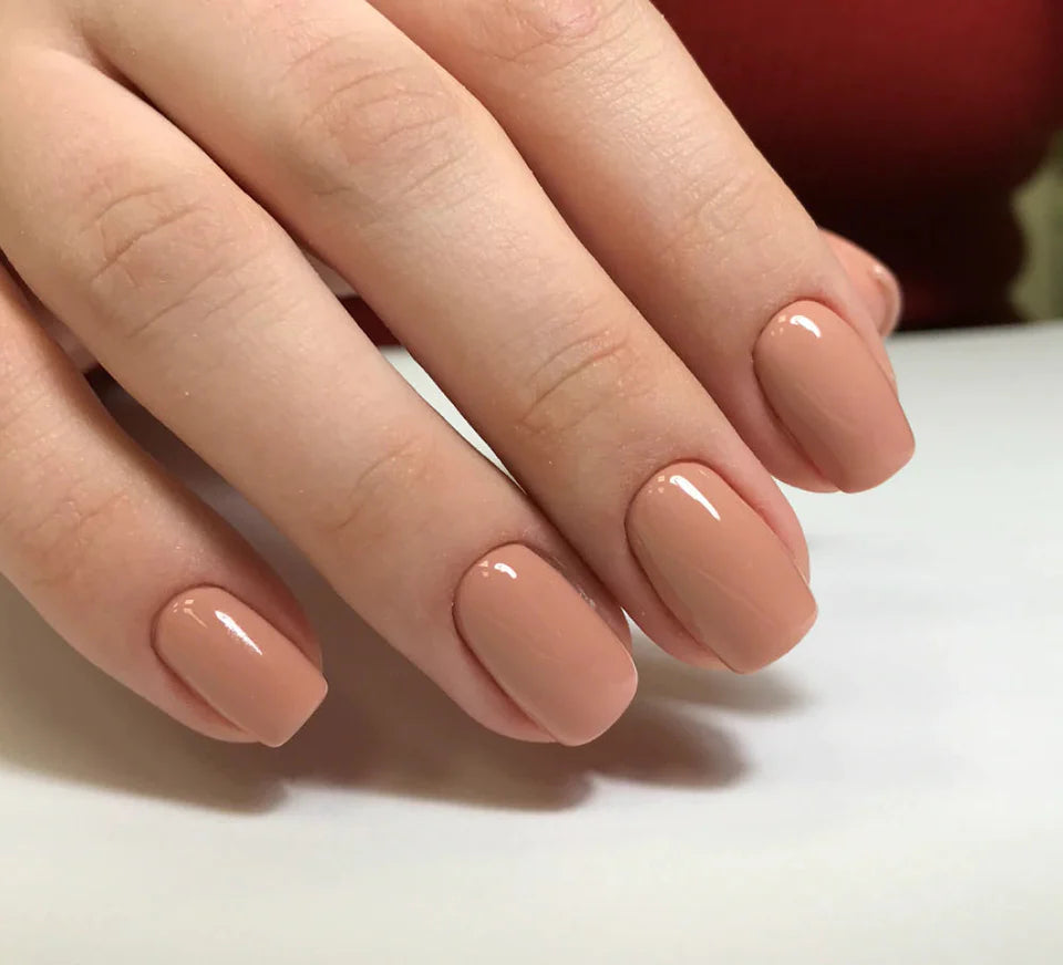 Luxio gel polish in neutral shade, 15ml bottle, showing smooth, glossy gel with a neutral nail color for professional nail art.