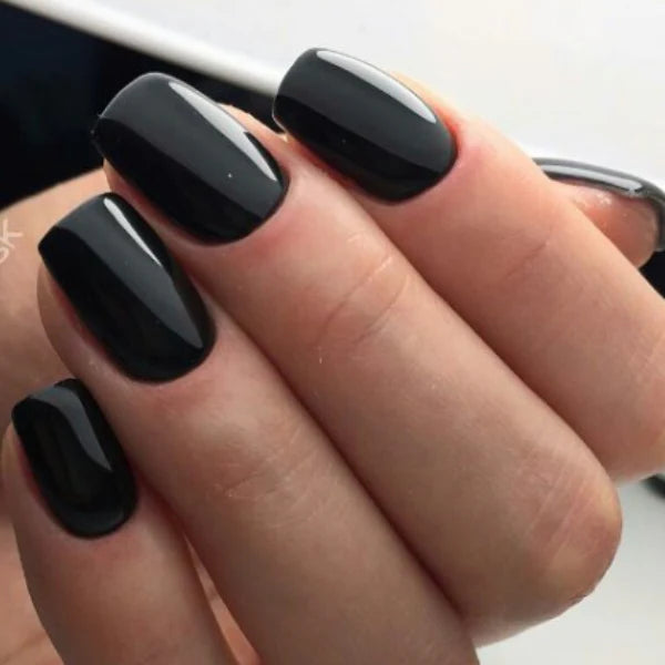 Luxio Soak-Off Gel Polish in Noir, 15ml, black gel nail polish with a glossy finish in a 0.5oz bottle.