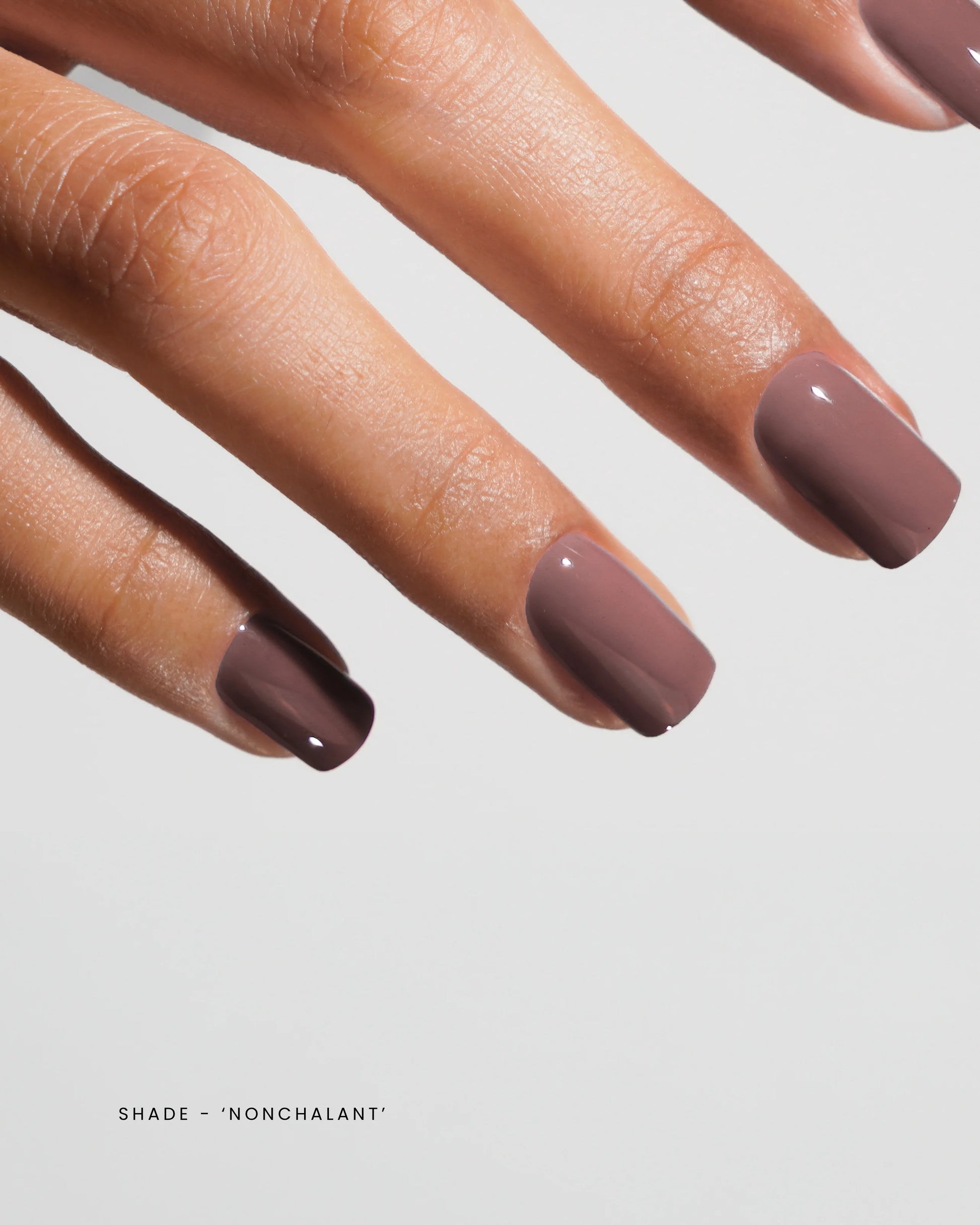 Luxio Soak-Off Gel Polish in Nonchalant 15ml bottle, TPO-Free, with a smooth, glossy finish and vibrant color.