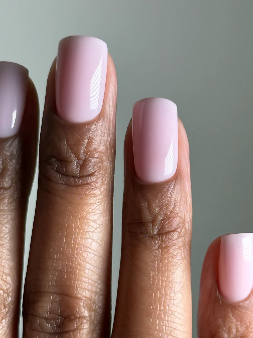 Luxio Luxio Soak-Off Gel Polish Petal semi-sheer 15ml bottle, showcasing the semi-transparent pink gel for nails.