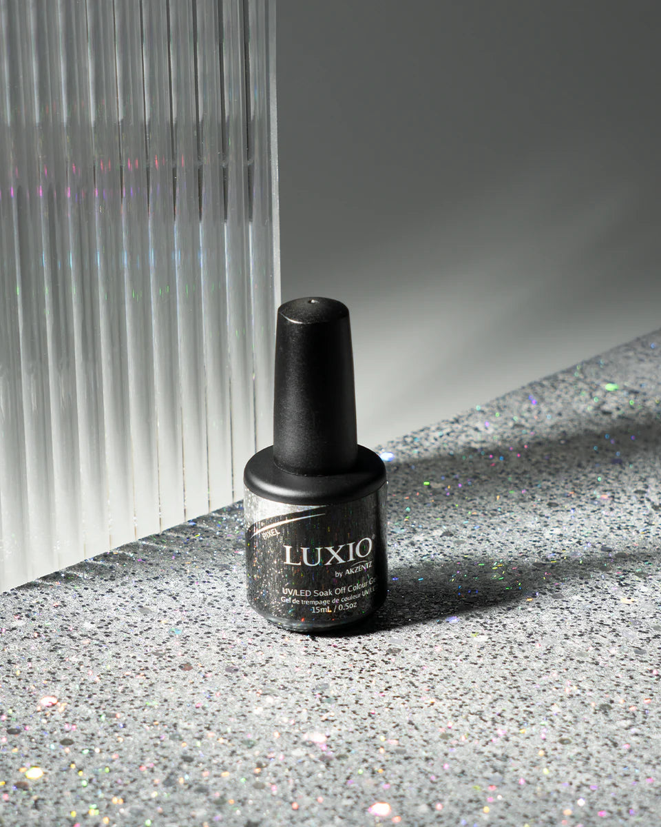 Luxio Soak-Off Gel Polish Pixel in glitter, 15ml, with a colorful, shimmering gel nail polish bottle and label.