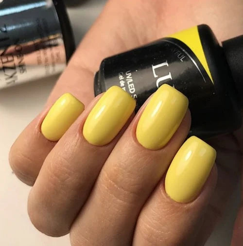 Luxio Soak-Off Gel Polish in Playful 15ml bottle, featuring vibrant color for gel manicures, with a sleek Luxio branding label.