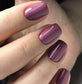 Luxio Luxio Soak-Off Gel Polish Plush 15ml bottle, featuring a sleek black cap and colorful gel inside, ready for professional nails.
