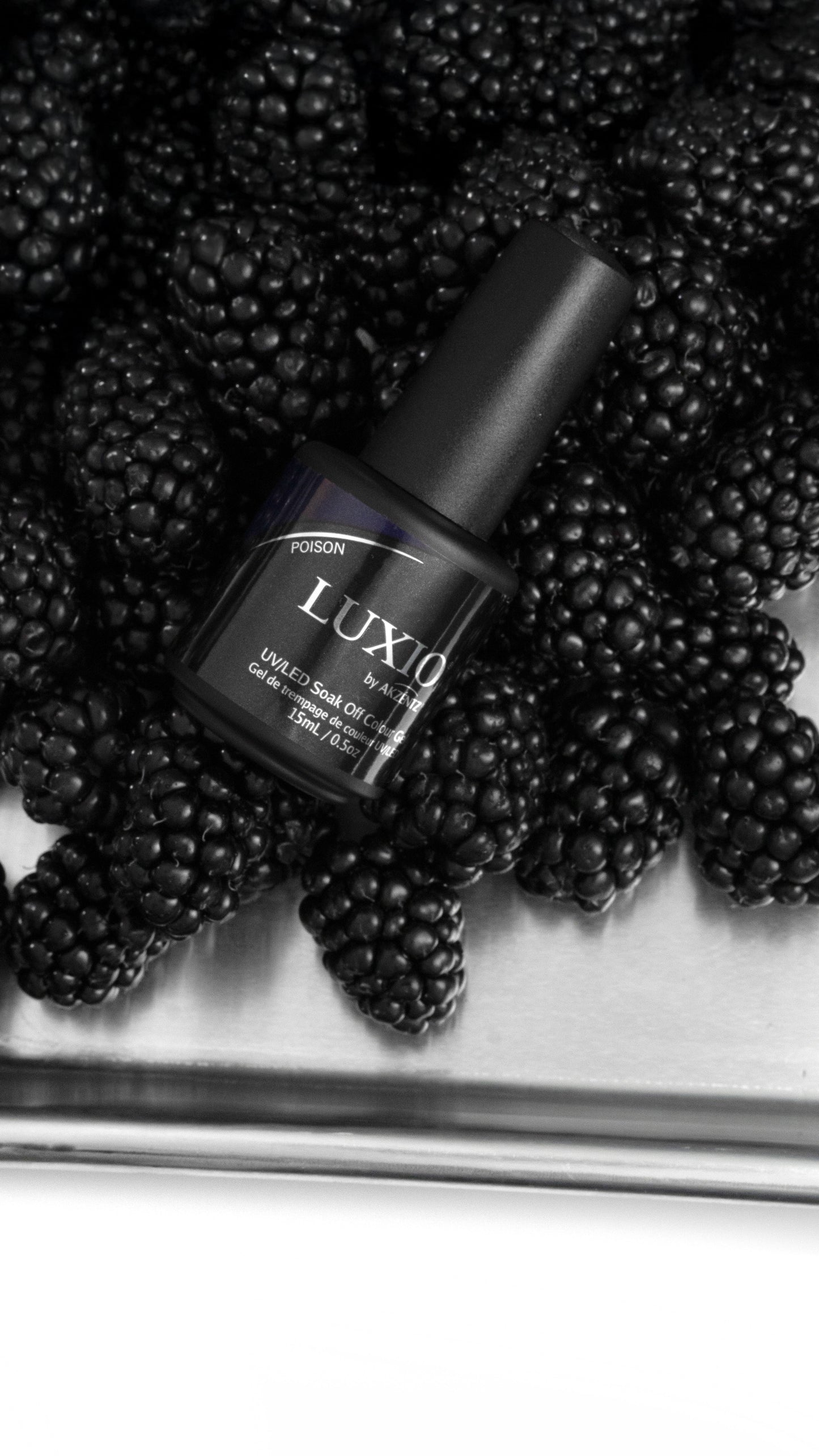 Luxio Poison soak-off gel polish in 15ml bottle, TPO-free, with deep purple color and glossy finish displayed in the image.