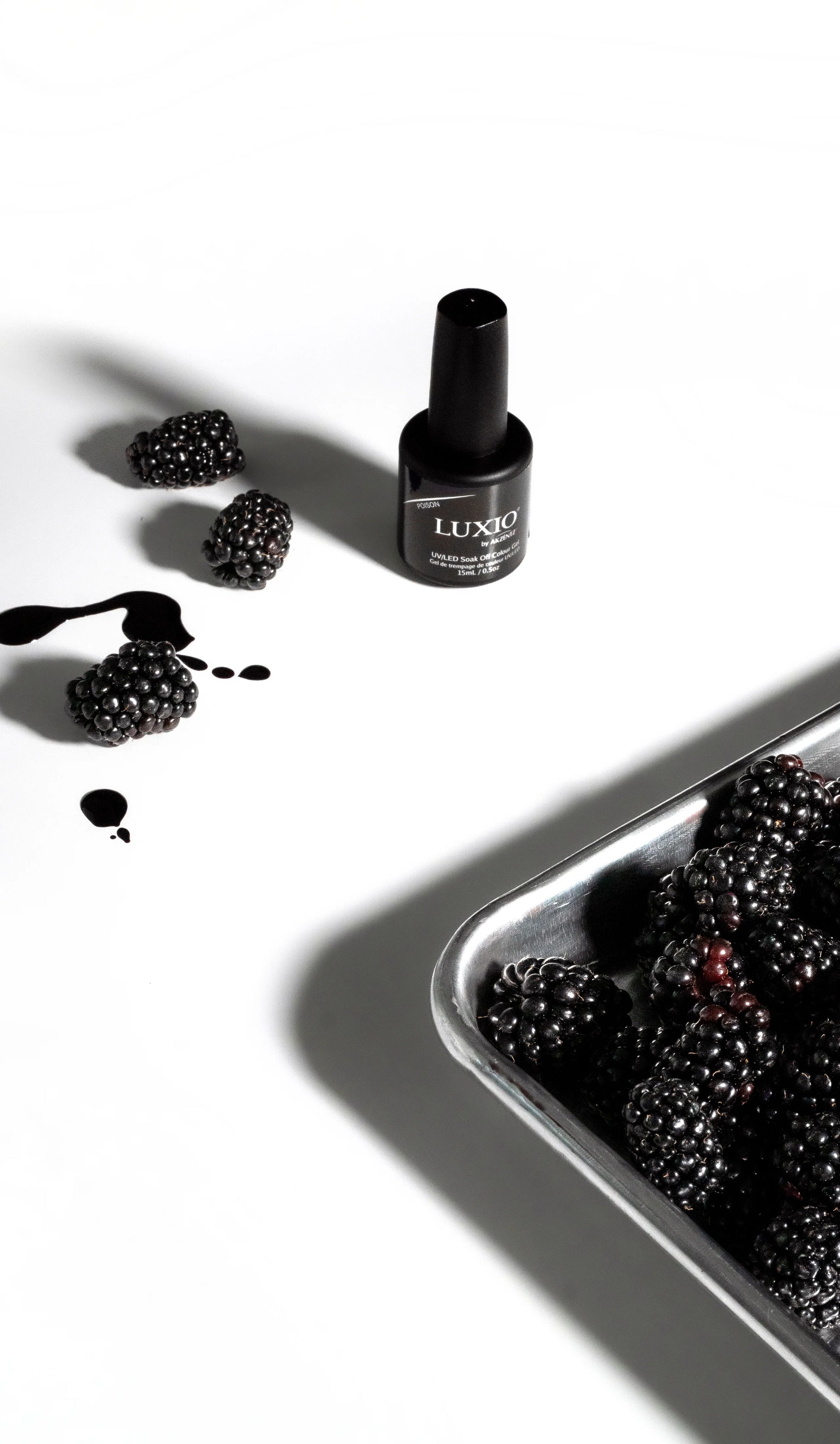 Luxio Soak-Off Gel Polish in Poison, 15ml bottle, featuring vibrant color and TPO-free formulation, displayed with the cap off.