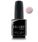 Luxio soak-off gel polish in Prim 15ml bottle, vibrant purple color, with brush applicator and clear gel label.
