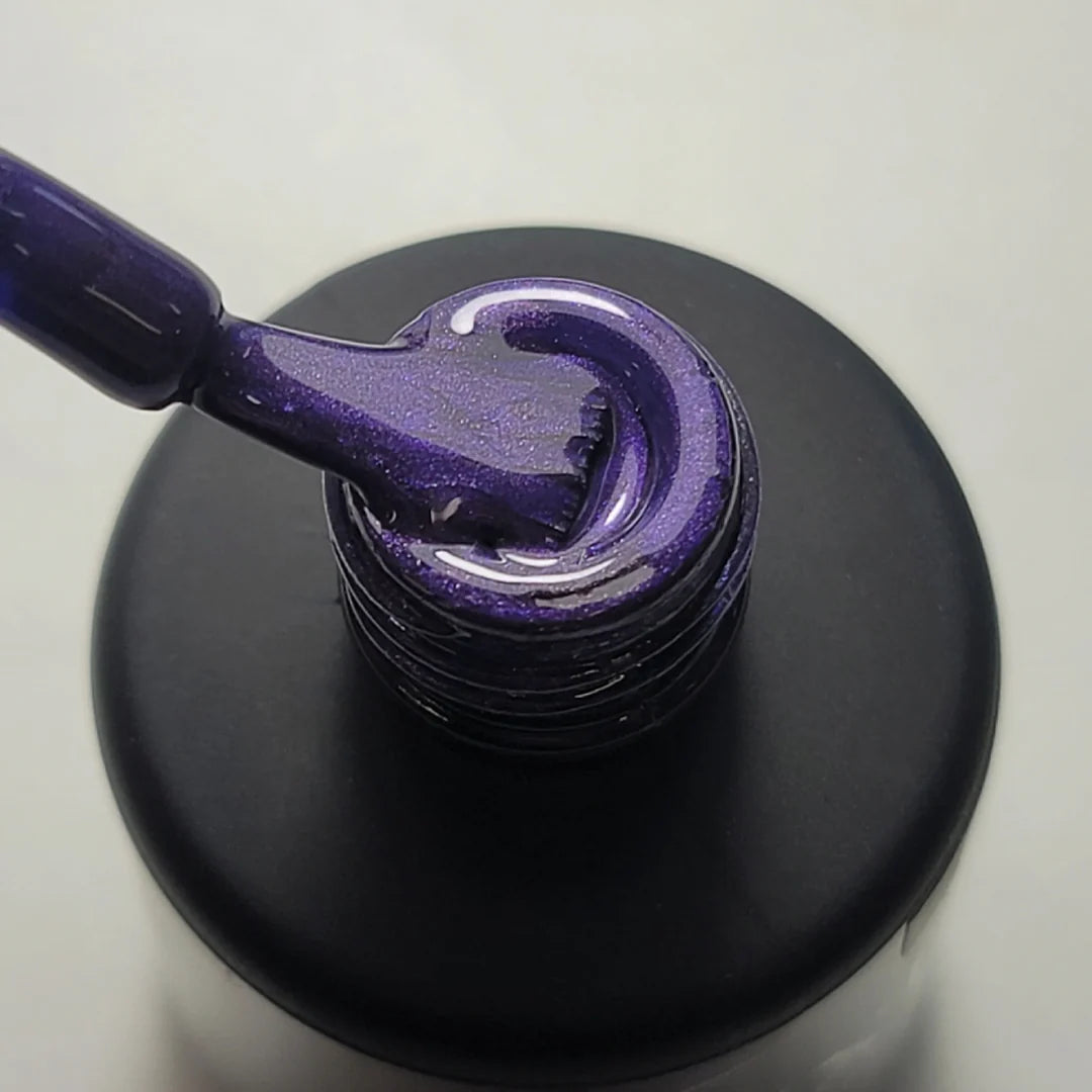 Luxio Soak-Off Gel Polish Provoke shimmer in 15ml bottle, showcasing a sparkling gel nail polish with a glossy finish.