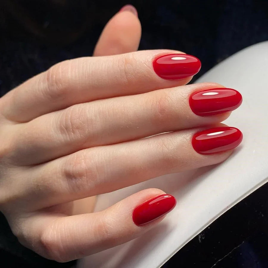 Luxio Soak-Off Gel Polish in Rosso, 15ml bottle, vibrant red color with smooth gel texture, ideal for manicures and nail art.