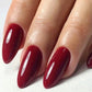 Luxio Soak-Off Gel Polish Ruby in 15ml bottle, vibrant red gel nail polish with smooth, glossy finish.