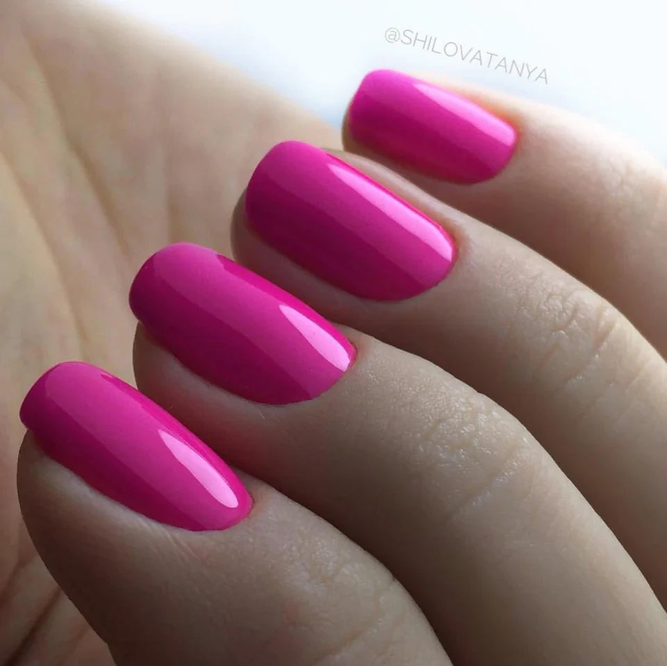 Luxio Soak-Off Gel Polish in Sassy 15ml bottle, showcasing vibrant pink color and sleek packaging.