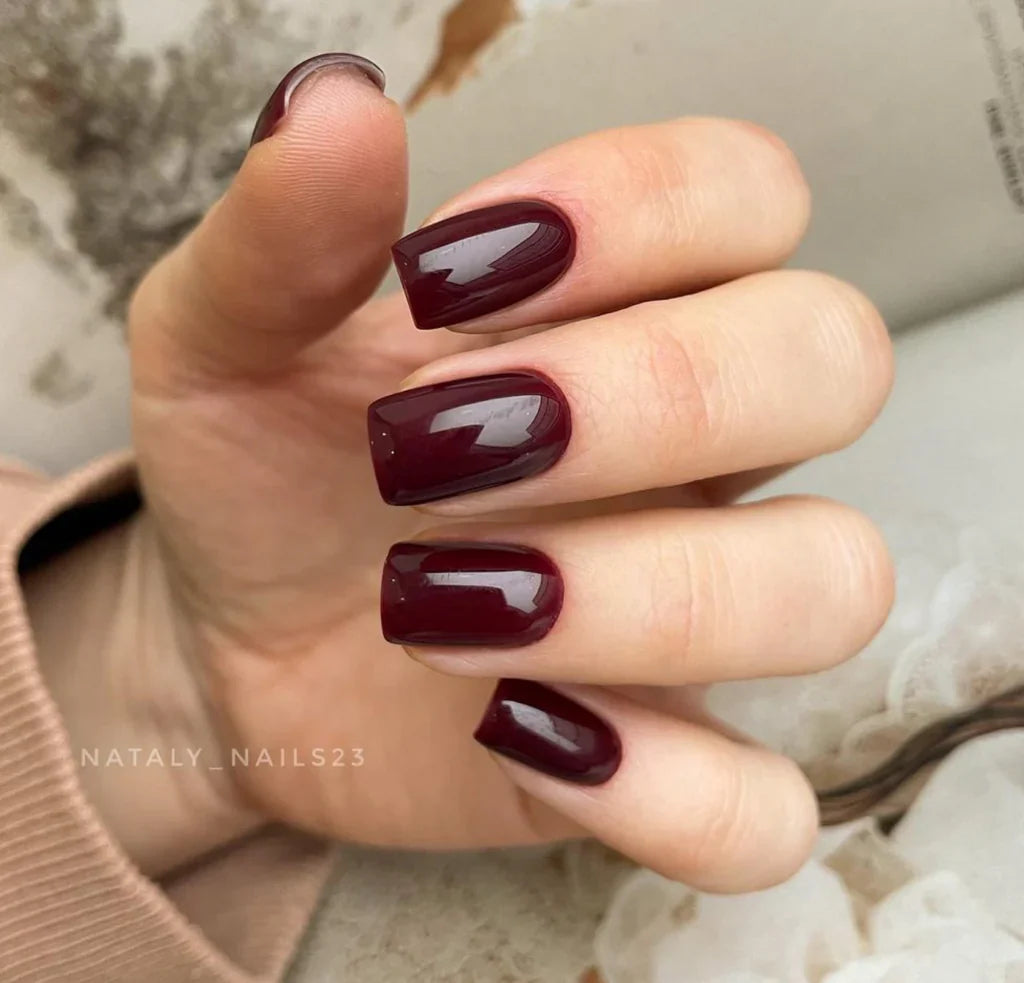 Luxio Soak-Off Gel Polish in Savour 15ml bottle, showcasing the vibrant, glossy nail polish color and branding on the container.