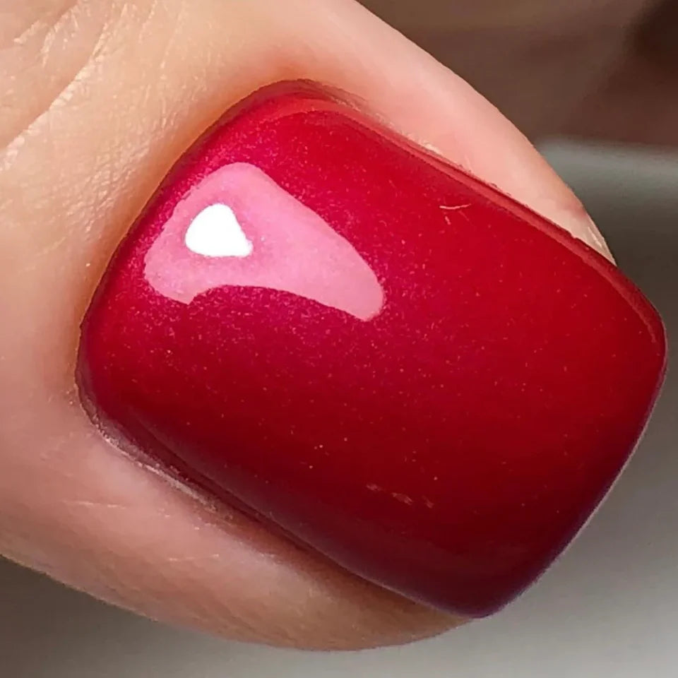 Luxio Soak-Off Gel Polish in Secret Frost shade, 15ml bottle, with a sleek black cap and clear glass showing the gel color.