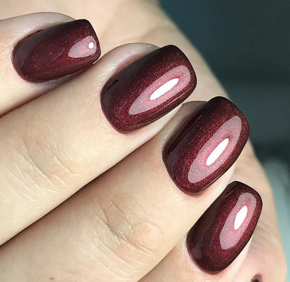 Luxio Seduction gel polish with shimmer, 15ml, showing a glossy, shimmering nail color in a Luxio brand soak-off gel bottle.
