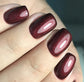 Luxio Seduction gel polish with shimmer, 15ml, showing a glossy, shimmering nail color in a Luxio brand soak-off gel bottle.