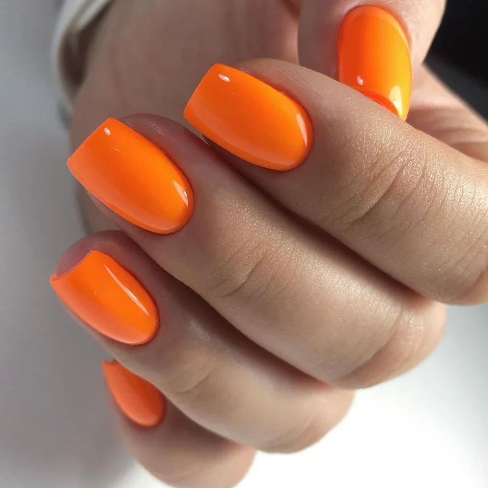 Luxio Soak-Off Gel Polish Shock Bright in 15ml bottle, showing vibrant gel polish color and applicator brush.