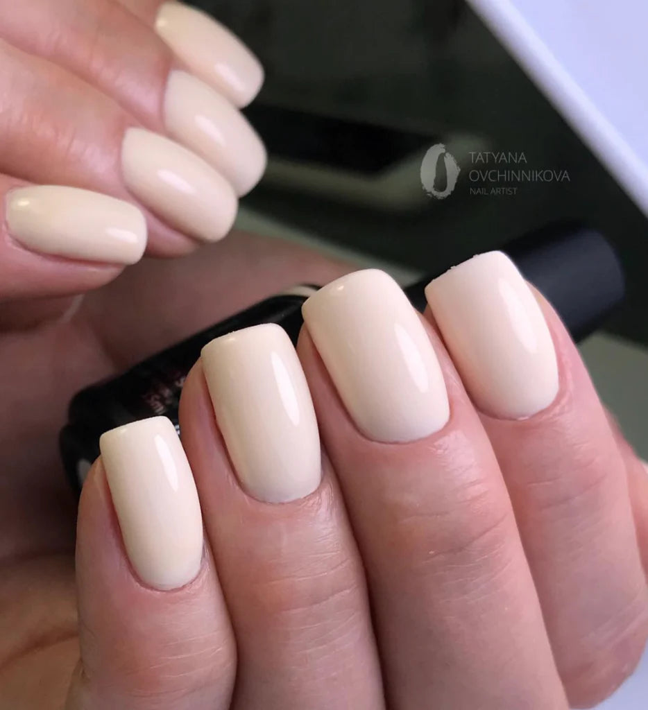 Luxio Soak-Off Gel Polish in Shy shade, 15ml, showcasing a smooth, glossy nail color in a professional beauty setting