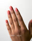Luxio Soleil soak-off gel polish in 15ml bottle, vibrant yellow color, with a smooth gel texture for professional manicures.