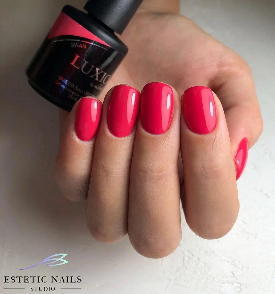 Luxio Soak-Off Gel Polish in Swan 15ml bottle, featuring a sleek black cap and clear label, on a white background.