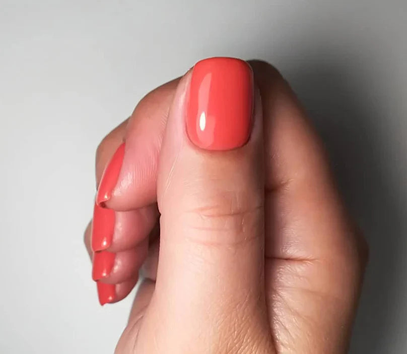Luxio Soak-Off Gel Polish in Tease, 15ml, featuring a smooth, light pink shade perfect for professional manicure nails.