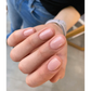 Luxio gel polish bottle labeled Luxio Soak-Off Gel Polish Timid Sheer 15ml, with a clear, light pink tint and branding visible.