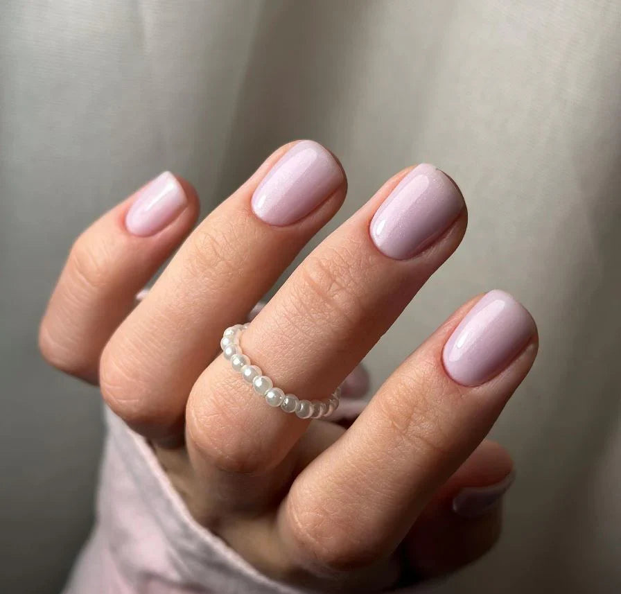 Luxio Soak-Off Gel Polish Vapour Shimmer 15ml bottle with shimmering gel polish, featuring a sleek black cap and clear label.