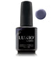 Luxio Vigilant soak-off gel polish in 15ml bottle, vibrant green color, with brand name and product details visible on the bottle