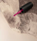 Close-up of Luxio Soak-Off Gel Polish Vitality 15ml bottle with brush applicator for luxurious gel nails.