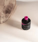 Open bottle of Luxio Soak-Off Gel Polish Vitality 15ml, showcasing the bright pink gel inside.