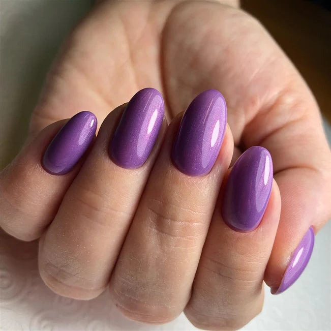 Luxio Luxio Soak-Off Gel Polish Vivacious Shimmer 15ml, vibrant pink gel nail polish with shimmering finish in a 15ml bottle