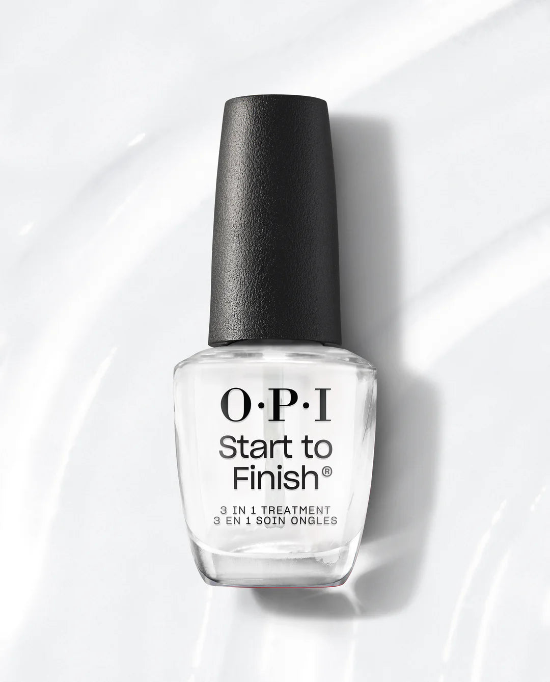 OPI 3-in-1 Start To Finish base coat, top coat, and nail strengthener applied on neatly manicured nails.
