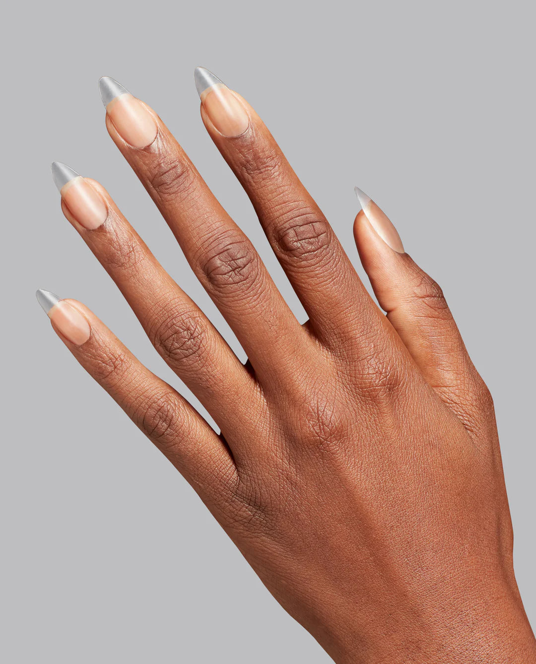 Clear medium almond-shaped Opi GELevate soft gel tips for full-coverage nail enhancements, displayed on a white background.