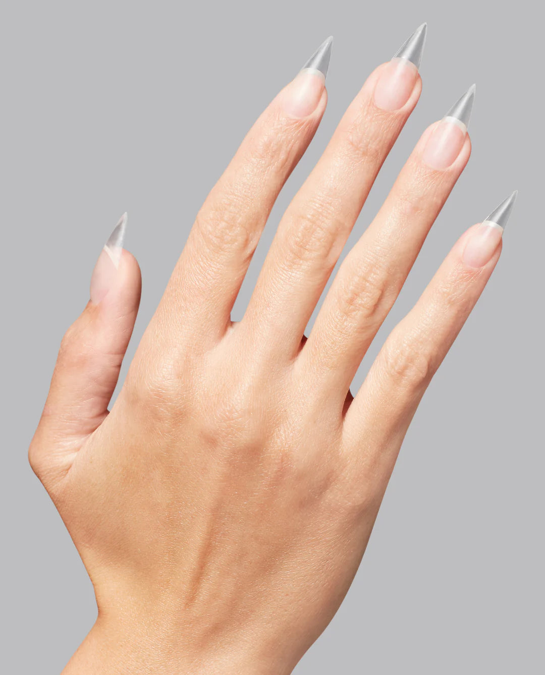 Opi GELevate™ soft gel tips in stiletto shape with full coverage, clear medium-length design for professional nail enhancements.