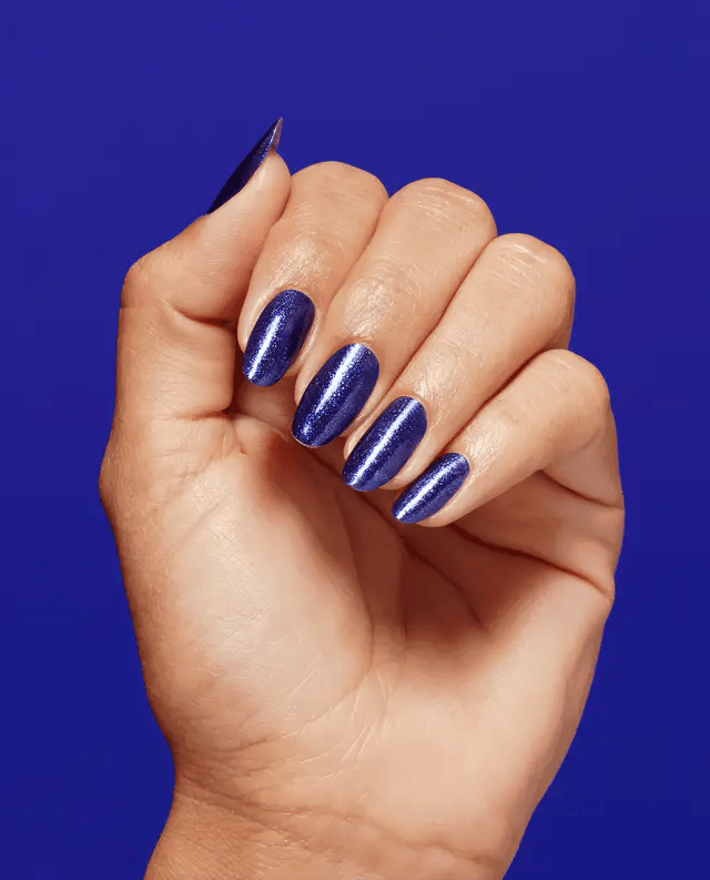 OPI Infinite Shine nail polish in AM 2 PM shade, featuring a glossy, vibrant finish on a sleek bottle.
