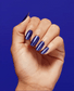 OPI Infinite Shine nail polish in AM 2 PM shade, featuring a glossy, vibrant finish on a sleek bottle.