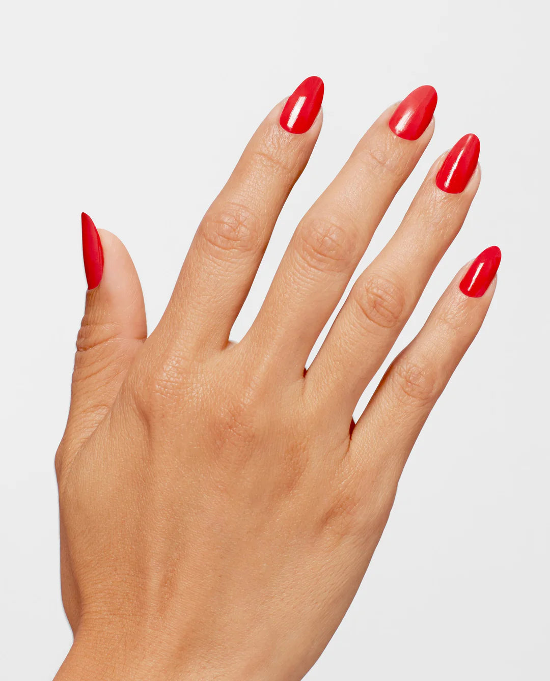 OPI Infinite Shine Cajun Shrimp nail polish bottle with vibrant coral-orange shade and glossy finish, showcasing the product and branding.