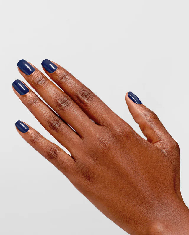 OPI Infinite Shine No Chips on My Shoulder nail polish bottle with a clean, glossy manicure showing its long-lasting shine.