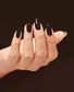 OPI Infinite Shine Not Afraid of the Dark ISL104 dark nail polish bottle with black cap and label, glossy finish, and vibrant color.