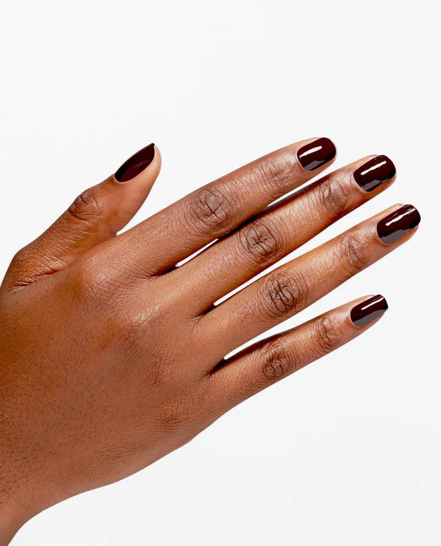 OPI Infinite Shine Not Afraid of the Dark nail polish on nails with a dark, glossy finish, showcasing the deep, rich color.