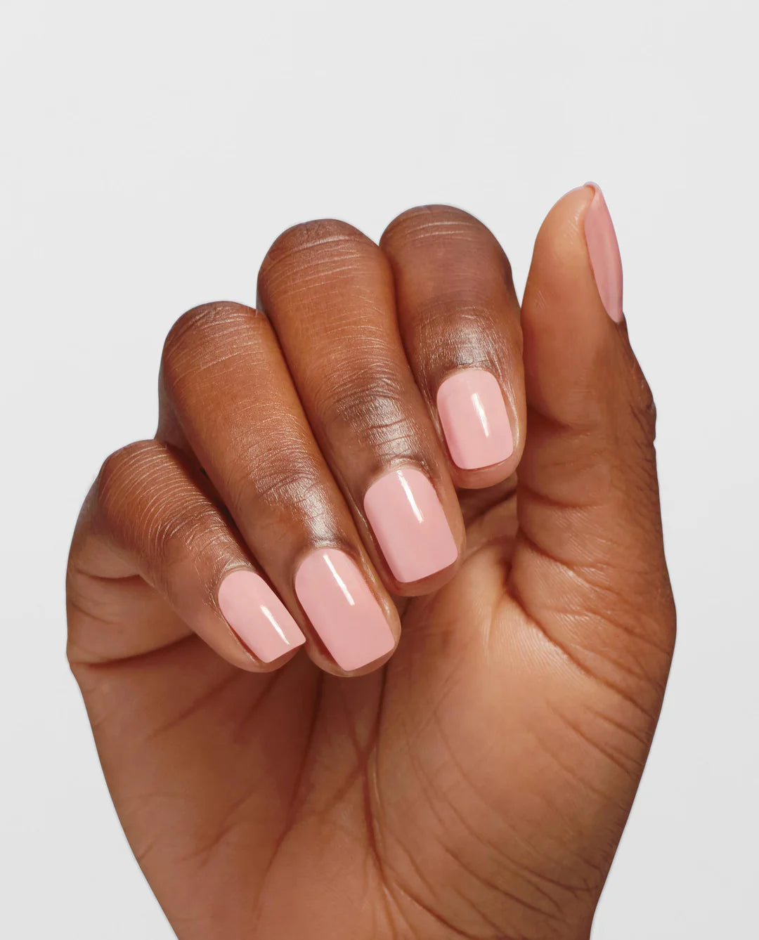 OPI Infinite Shine Passion nail polish bottle with vibrant pink color, glossy finish, and brand logo on the label.