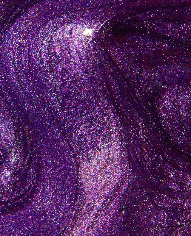 OPI Infinite Shine Purple Reign nail polish swatch showing rich purple color on a nail sample.