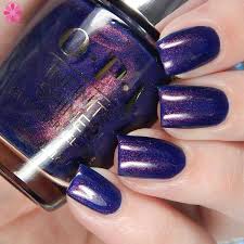 OPI Infinite Shine nail polish in Turn On the Northern Lights! ISL I57, deep shimmering blue bottle with applicator brush.