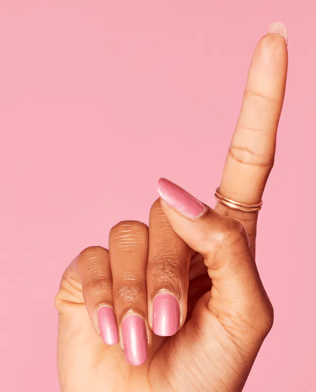 Opi Intelli GelColor Aphrodite's Pink Nightie gel nail polish in a soft pink shade, displayed in a bottle with a white cap.