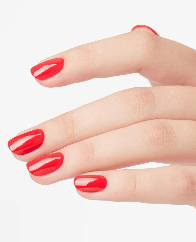 OPI Intelli GelColor Cajun Shrimp gel nail polish on nails with a vibrant coral-orange hue, showcasing a glossy finish.